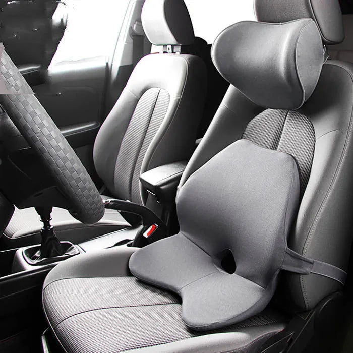 Memory foam car seat cushion and optional headrest in beige colour on a car seat