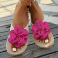 Women's floral pattern PU slippers in beige, shown in a casual flip-flop style with a round toe.