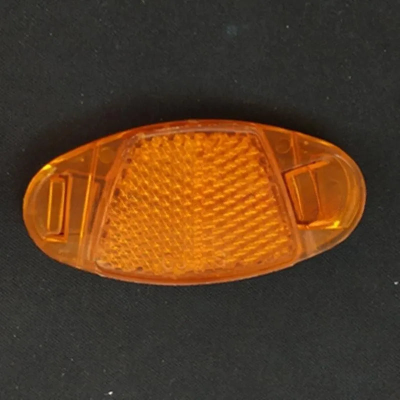 Yellow and white bicycle wheel reflector decorations for spokes measuring 7.2cm by 3.5cm