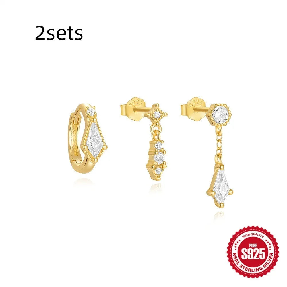 Three pairs of geometric zircon tassel earrings in sterling silver with gold tone variations