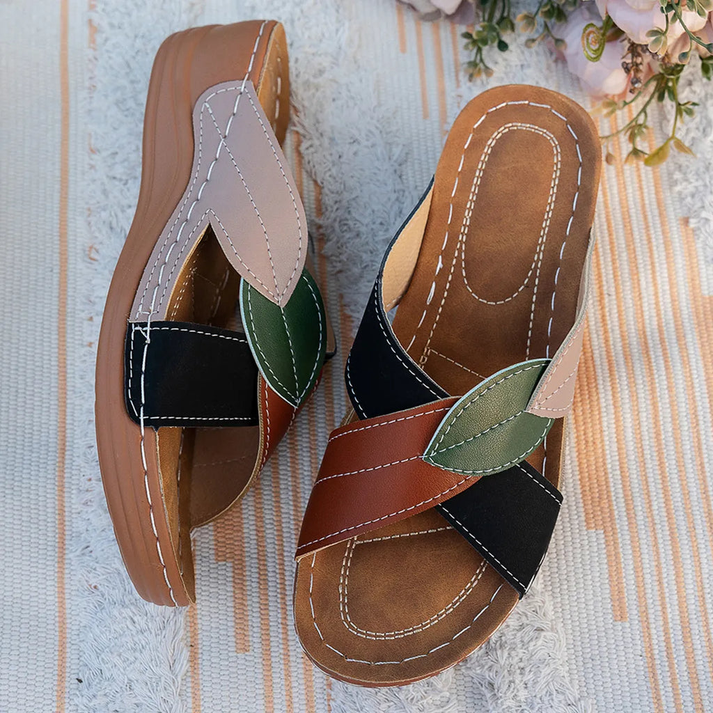 Women's red-brown cork wedge sandals with leaf design and gladiator lace-up ankle strap