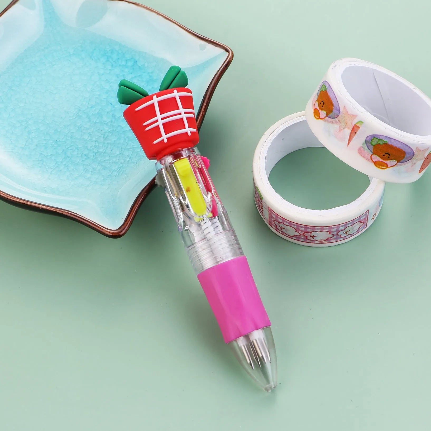 Compact 11cm Christmas four-colour ballpoint pen with press mechanism in festive designs
