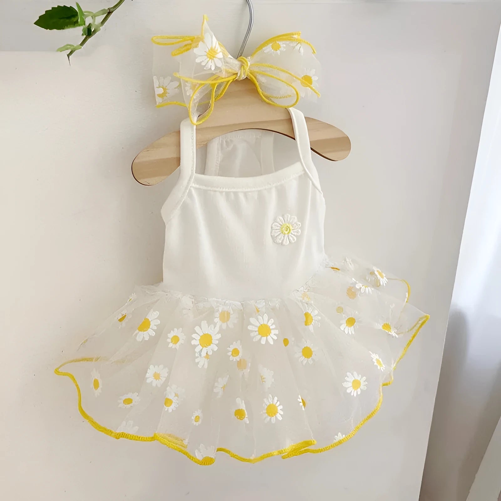 Yellow daisy pattern polyester dog summer clothing outfit shown on dog model