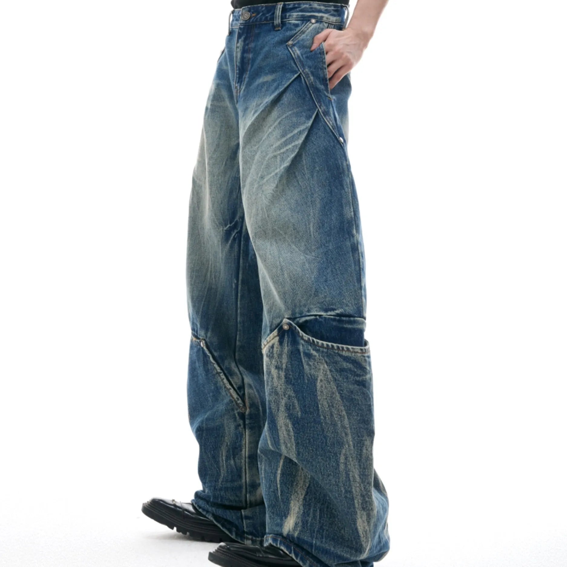 Men's retro washed burst pattern jeans with curved knife details in verdant blue colour