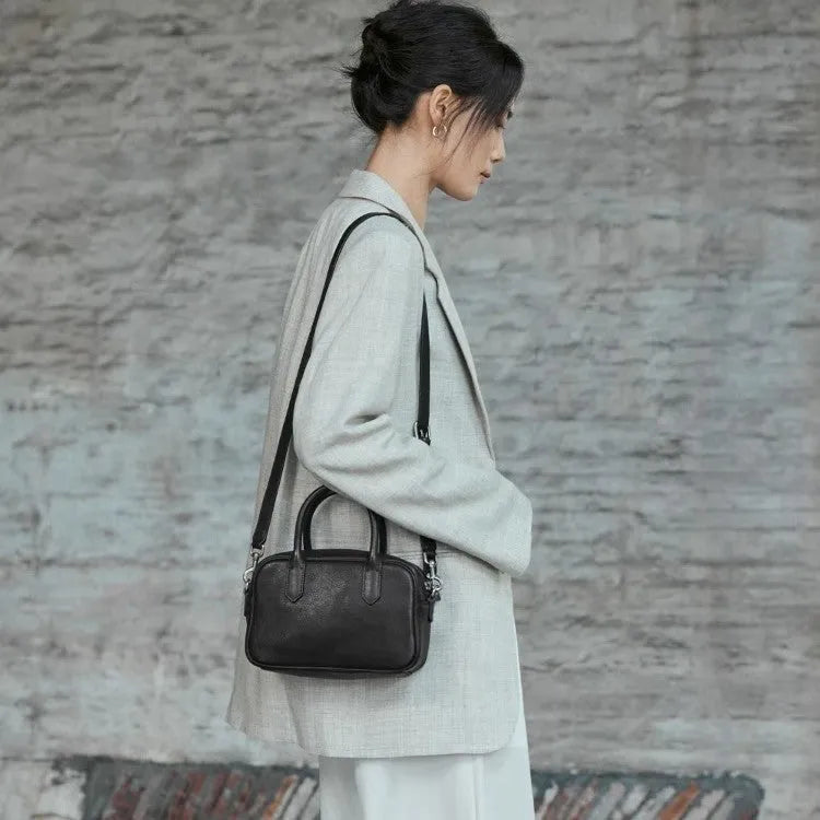 Genuine leather crossbody bag for women in coffee colour with horizontal square shape and metal zip