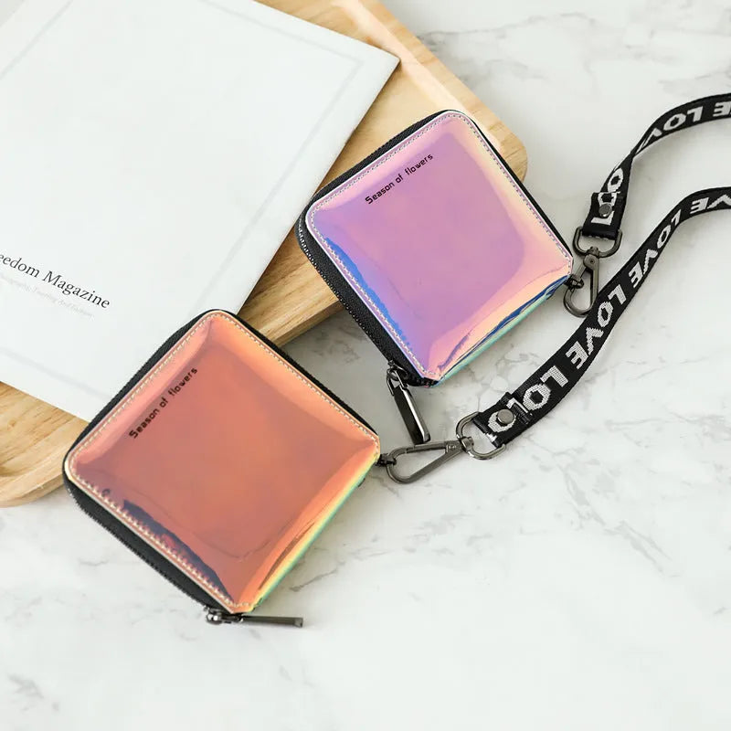 Women's Korean style short folding wallet in glitter blue or green colours showing compact 11cm dimensions