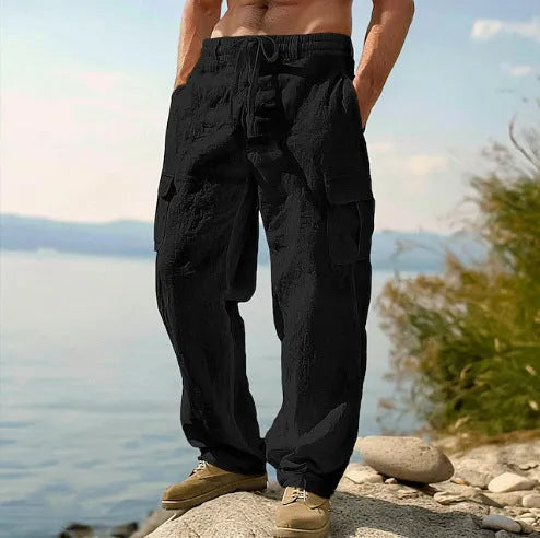 Men's cotton wide-leg casual trousers in light army green colour showing relaxed fit and mid-waist design