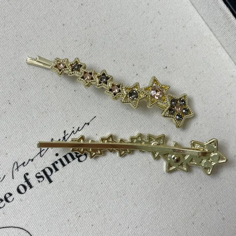 Gold-coloured rhinestone barrette clip with star charm for bangs