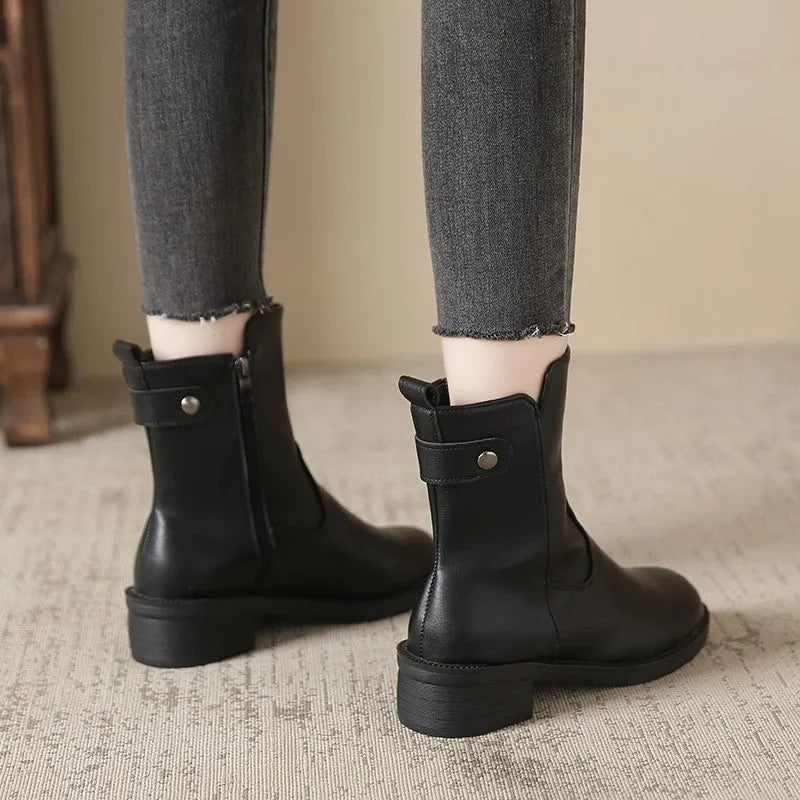 Women's black side zip ankle boots with round toe and low rubber sole