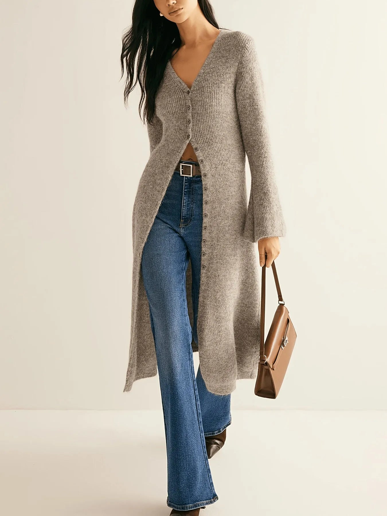 Khaki long sleeve coat cardigan with button front in a retro French style.