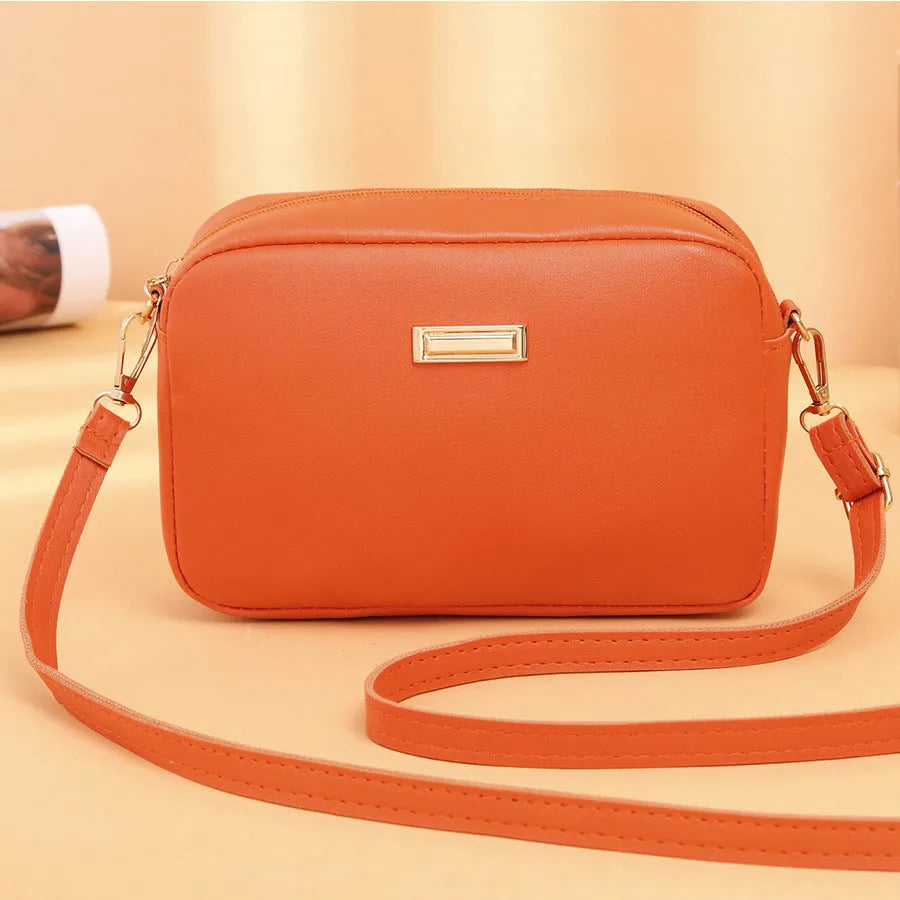 Women's solid colour PU leather shoulder bag with three-dimensional pockets in five colour options