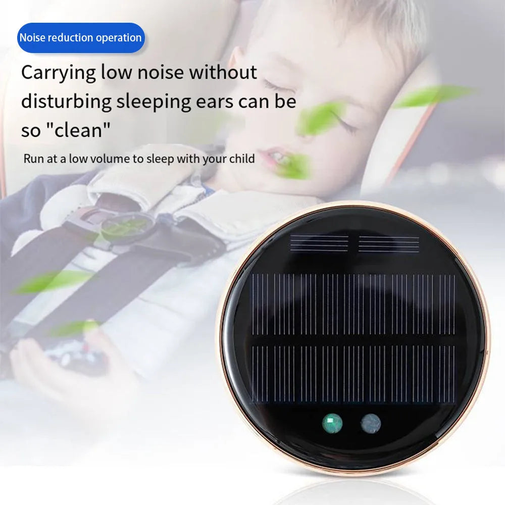 Black solar-powered car humidifier mounted on a vehicle air conditioning vent.