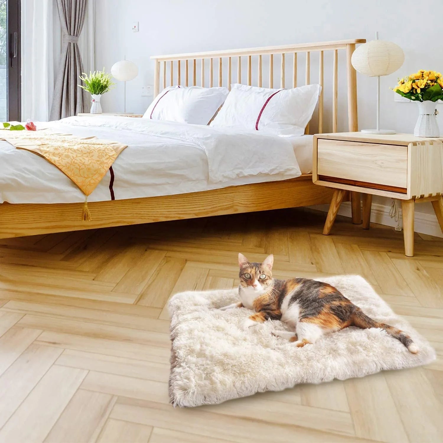 Grey pet blanket with long plush hair and black non-slip bottom particles