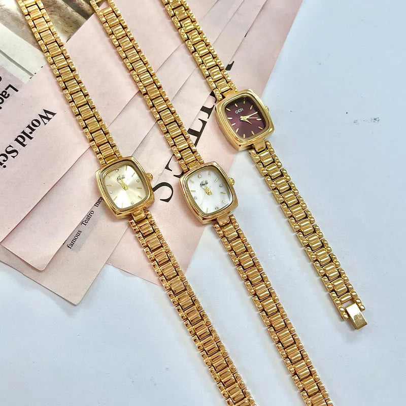 Small gold watch with gold alloy case and strap, 8mm thin, gold face