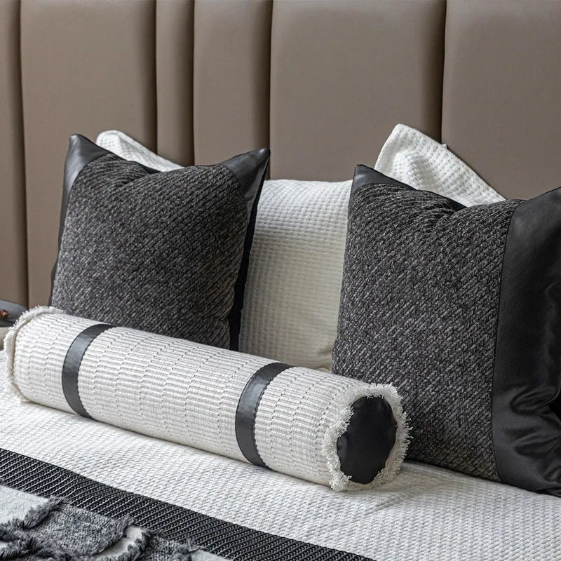 Polyester bed runner and nap blanket set with plaid pattern on bed with matching pillowcase and round pillow