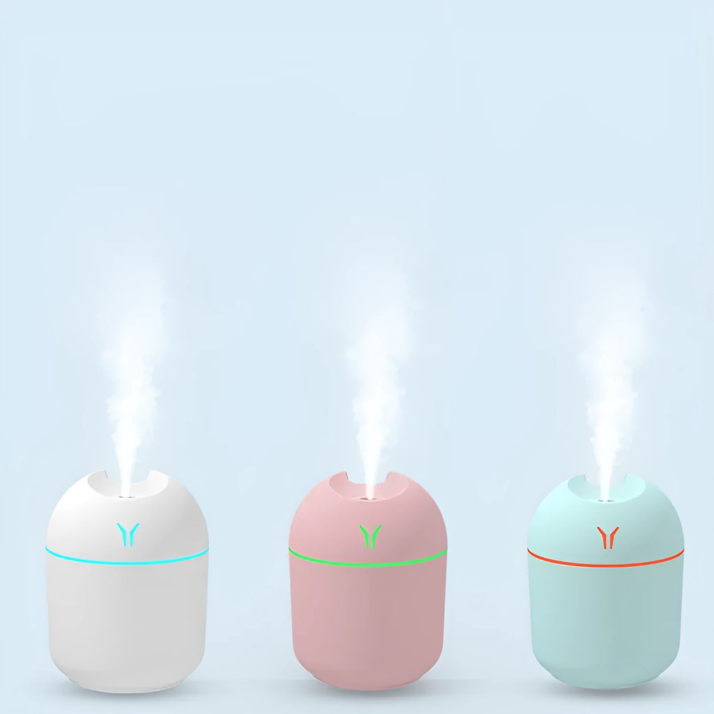 Round desktop humidifier in ivory white colour with USB cable and 250ml capacity marking