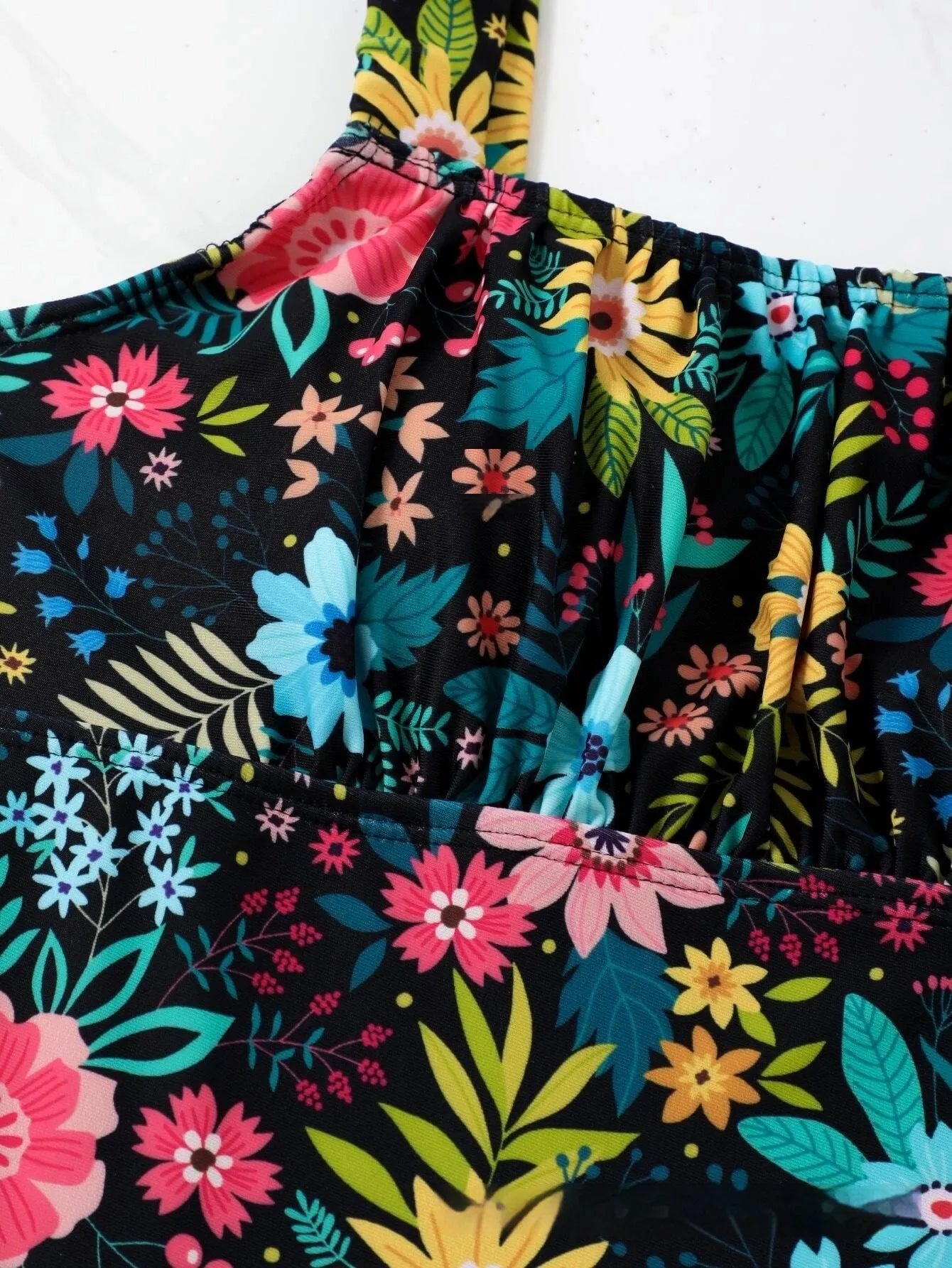 Women's pastoral floral print one-piece swimsuit with full-bed coverage in polyester fabric.
