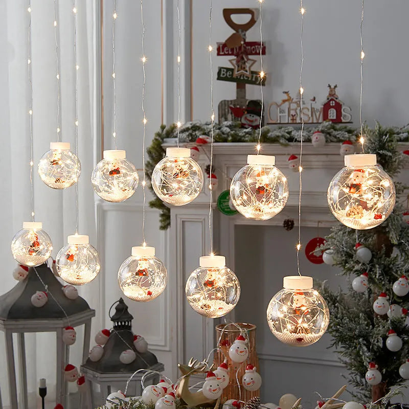 Christmas curtain light string with ten LED wishing ball lamps showing snowman, Christmas tree and elder designs