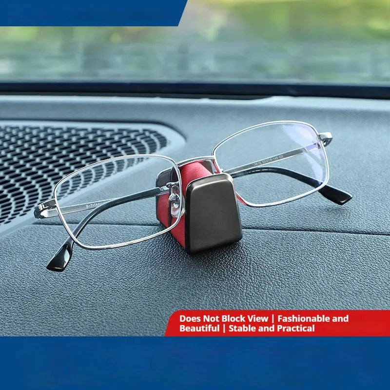 Zinc alloy and leather sunglasses clip for car dashboard in green, black, grey, or red.