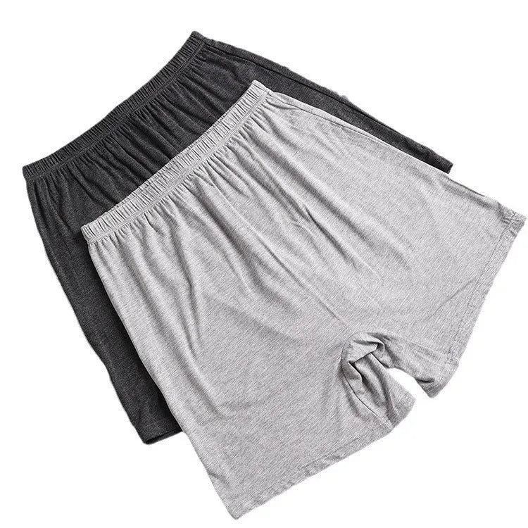 Mannequin wearing solid black high waist modal boxer shorts for men