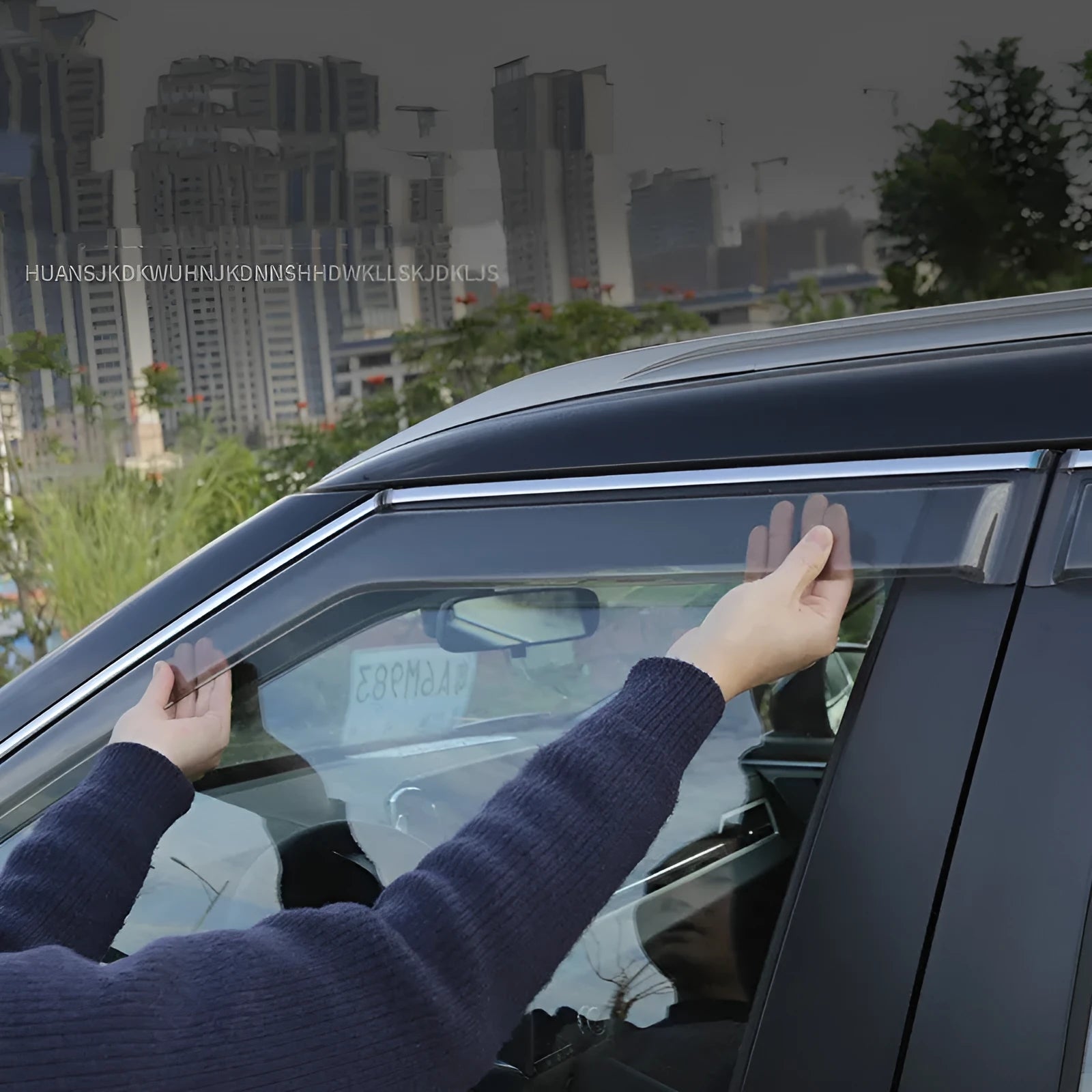 Black Warrior and translucent window deflector sets for a 2023 Mitsubishi Outlander.