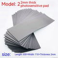 Black and grey light-sensitive seal mat for pottery and calligraphy projects showing 330mm x 110mm sheet