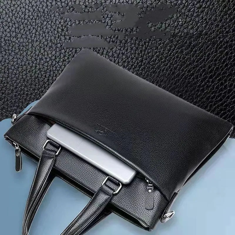 Men's black and brown PU leather business messenger bag with splicing design on a table.