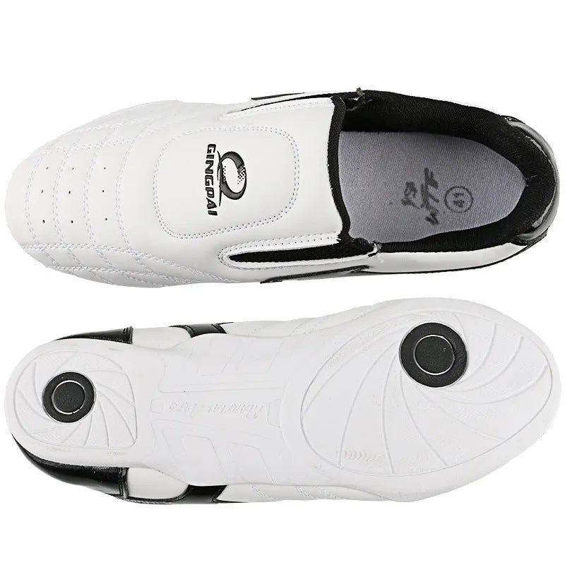 Black and white children's PU martial arts training shoes with soft sole for Taekwondo and Sanda.