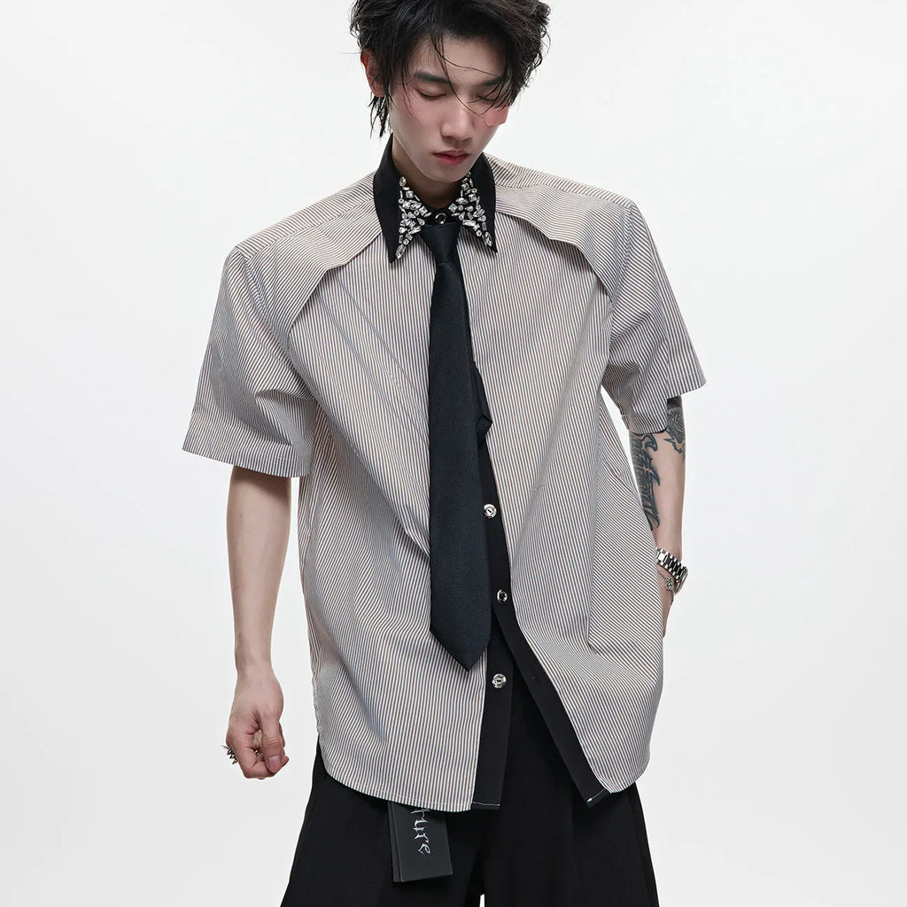Men's blue and khaki patchwork striped shirt with diamond tie detail and quilted texture.