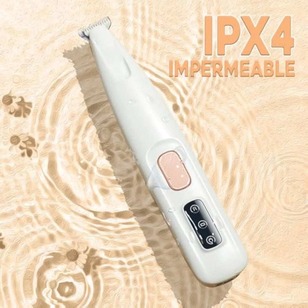 White rechargeable electric dog paw trimmer with LED light on a compact handheld unit.