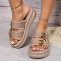 Women's thick bottom slippers with suede upper and rubber sole in apricot, black, and off-white colours