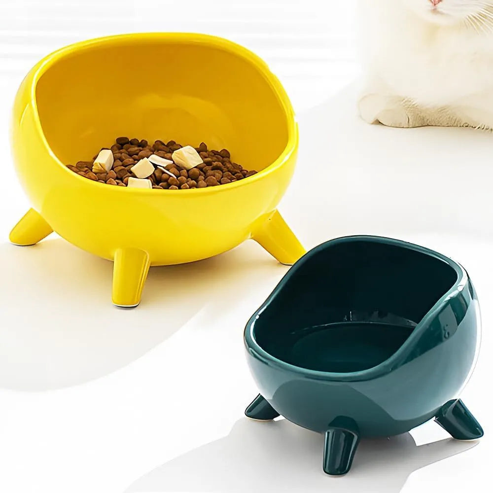Green ceramic pet bowl with four-legged stable base and wide-mouth design