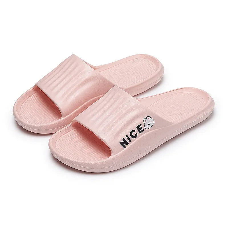 Adult unisex EVA bathroom slippers with cartoon pattern and non-slip sole in multiple colour options