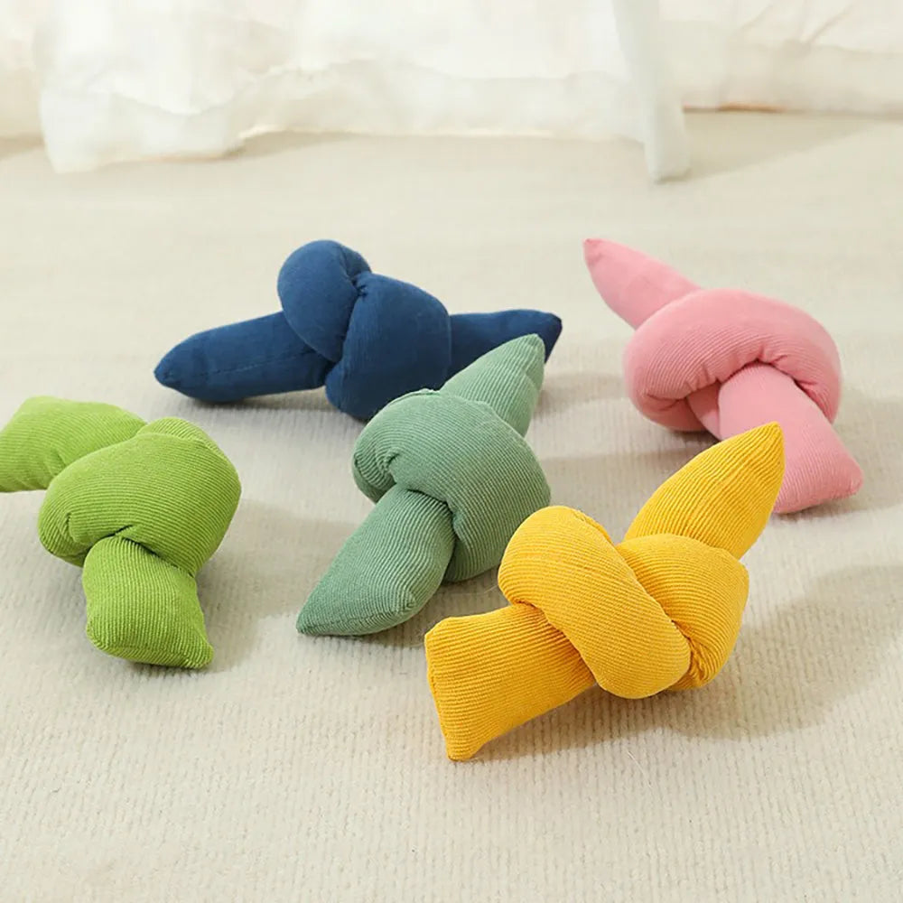 White natural cotton dog rope toy with multiple knots for tugging and chewing