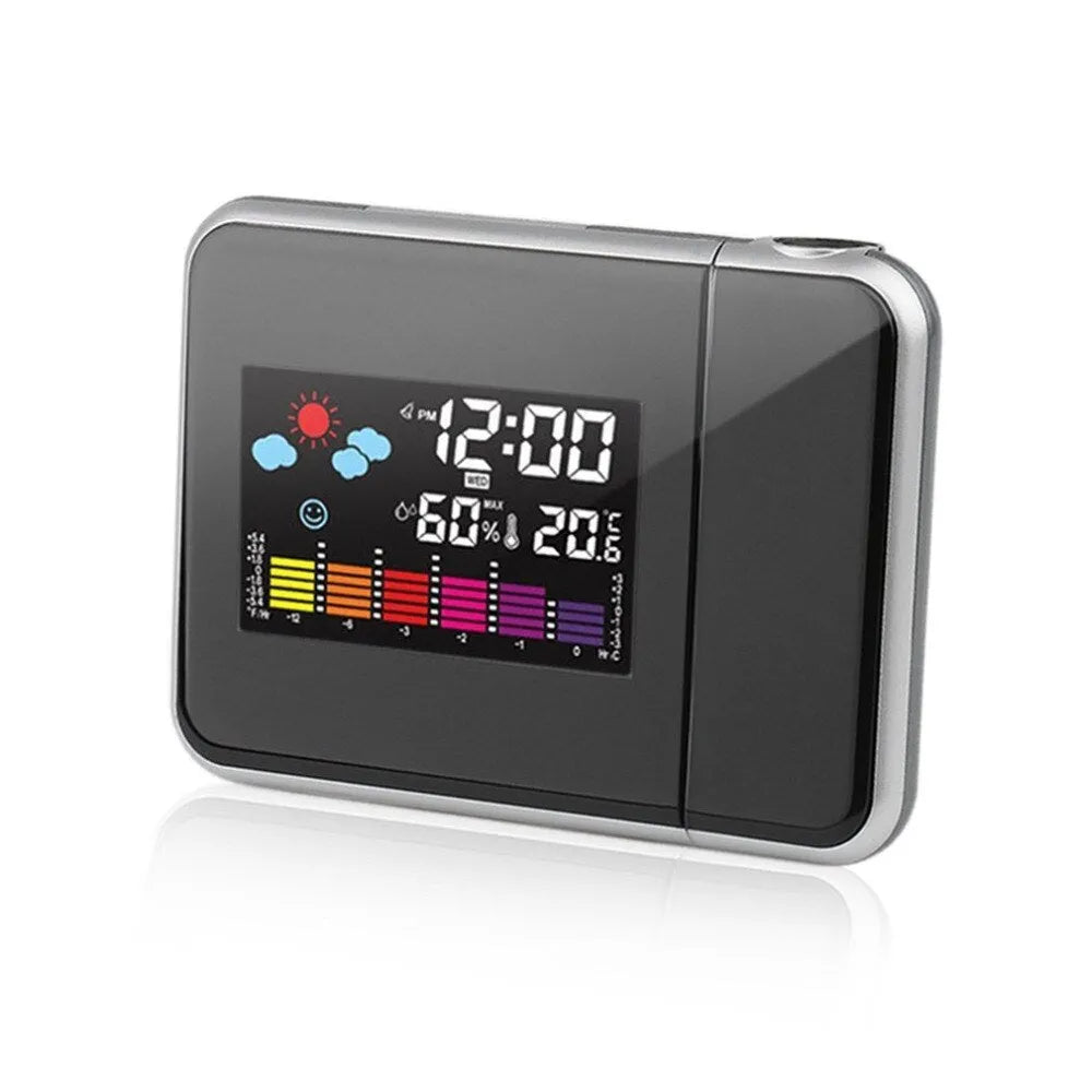 Black digital projection alarm clock with LED display showing time temperature humidity
