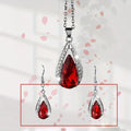 Teardrop pendant necklace and earrings jewellery set in black or red colour options