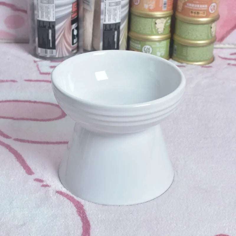 Black ceramic pet bowl with high foot and raised neck for dog or cat feeding