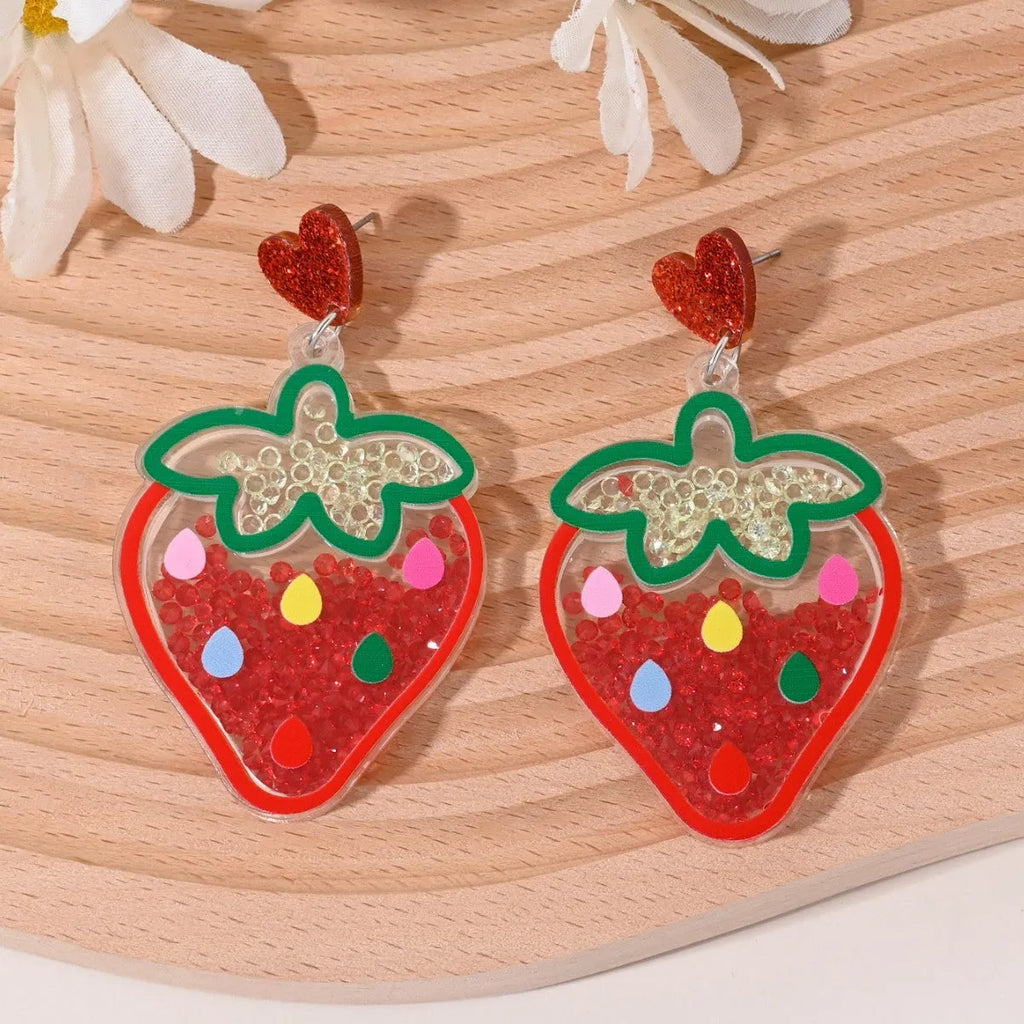 Colourful acrylic fruit and ice cream dangle earrings for women on a white background.