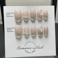 Blush-coloured false nails with 14-short ladder A pattern, shown in XS, S, M, L sizes.