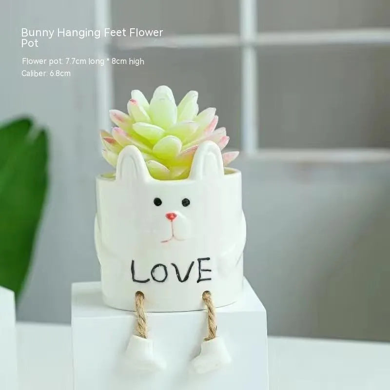 Ceramic hanging foot flowerpot in a cartoon style for desktop succulents.