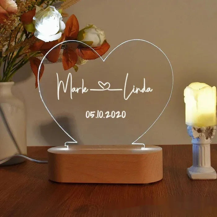 Transparent acrylic custom night light measuring 20cm by 11.5cm with personalised text