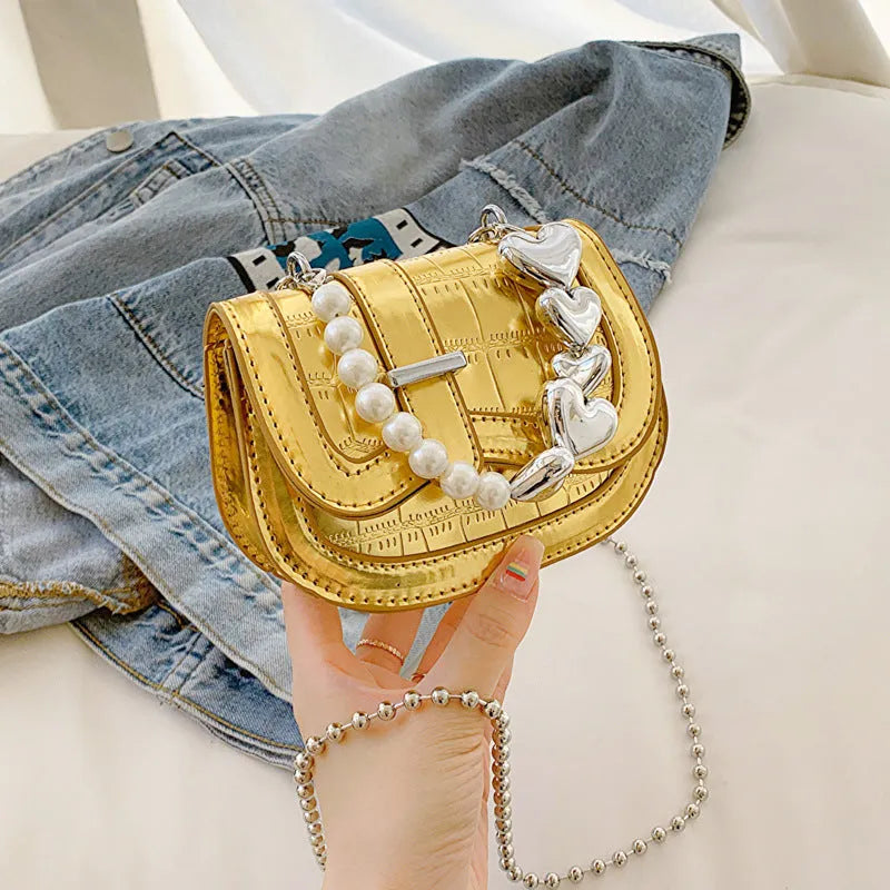 Women's silver PU leather mini tote saddle crossbody bag with single strap and outer pocket