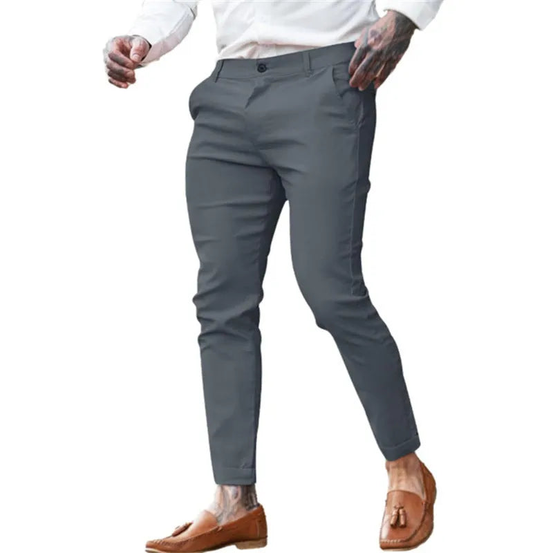 Men's slim fit stretch cotton twill pencil trousers in a choice of solid colours.