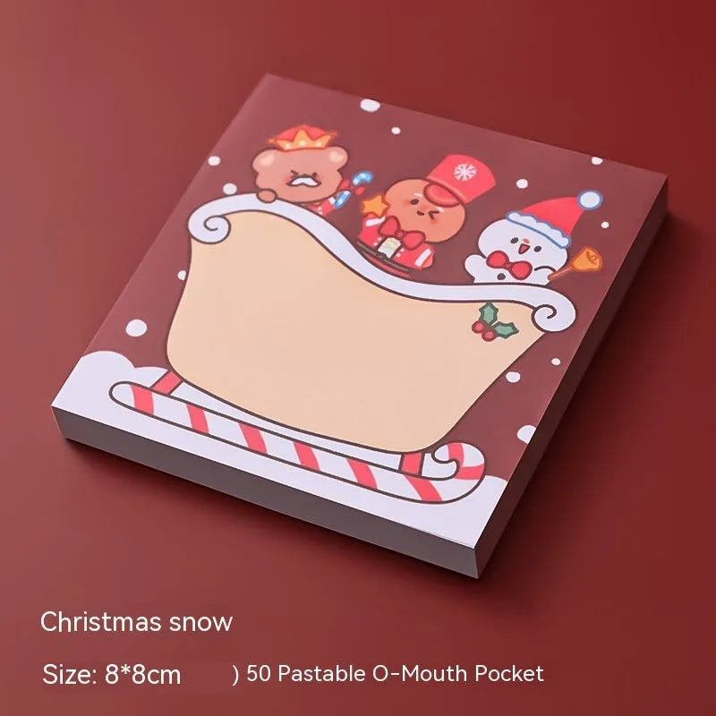 Christmas sticky notes pad showing eight festive designs including Santa Claus, elf, snowman, and gift box