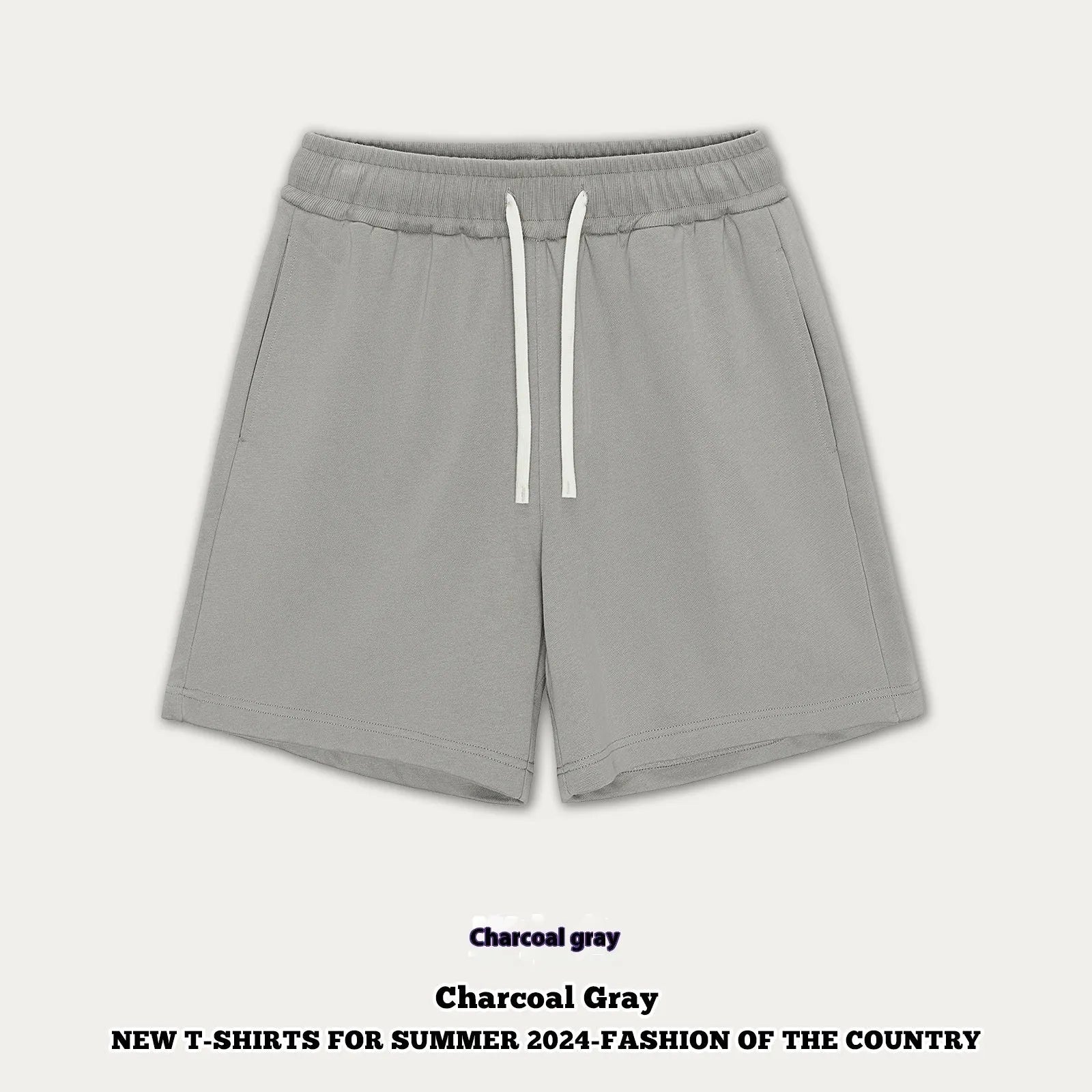 Loose cotton denim shorts for baby boy or girl in charcoal grey colour on a hanger