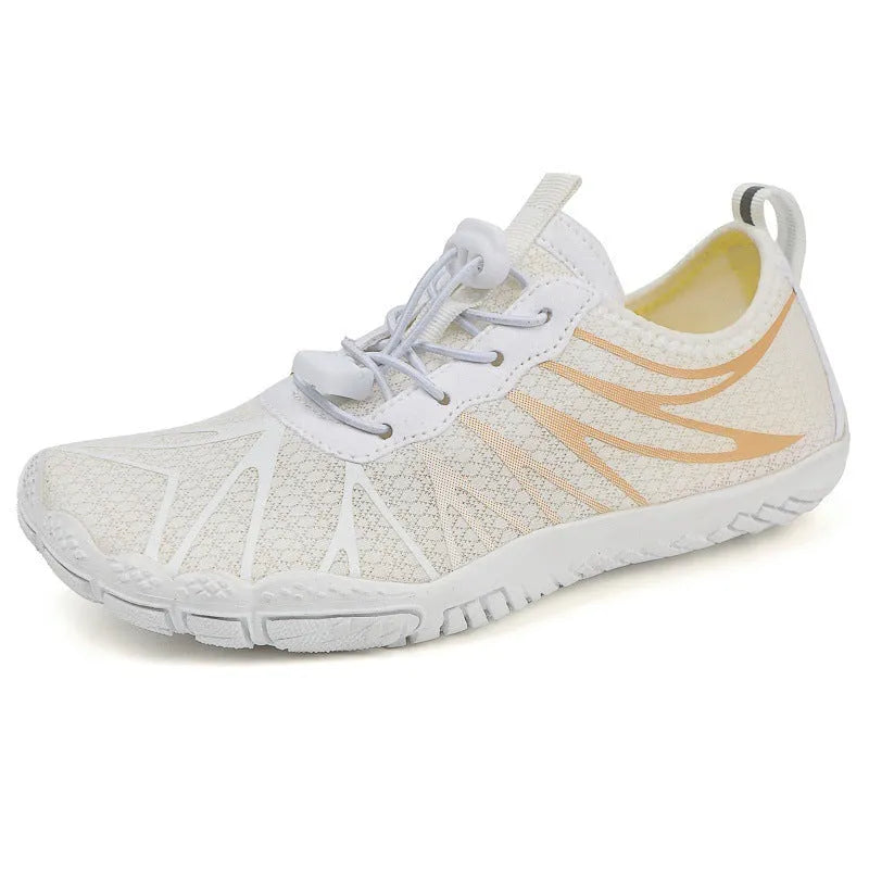Casual low-top sports shoe with lace-up front in multiple colour options.