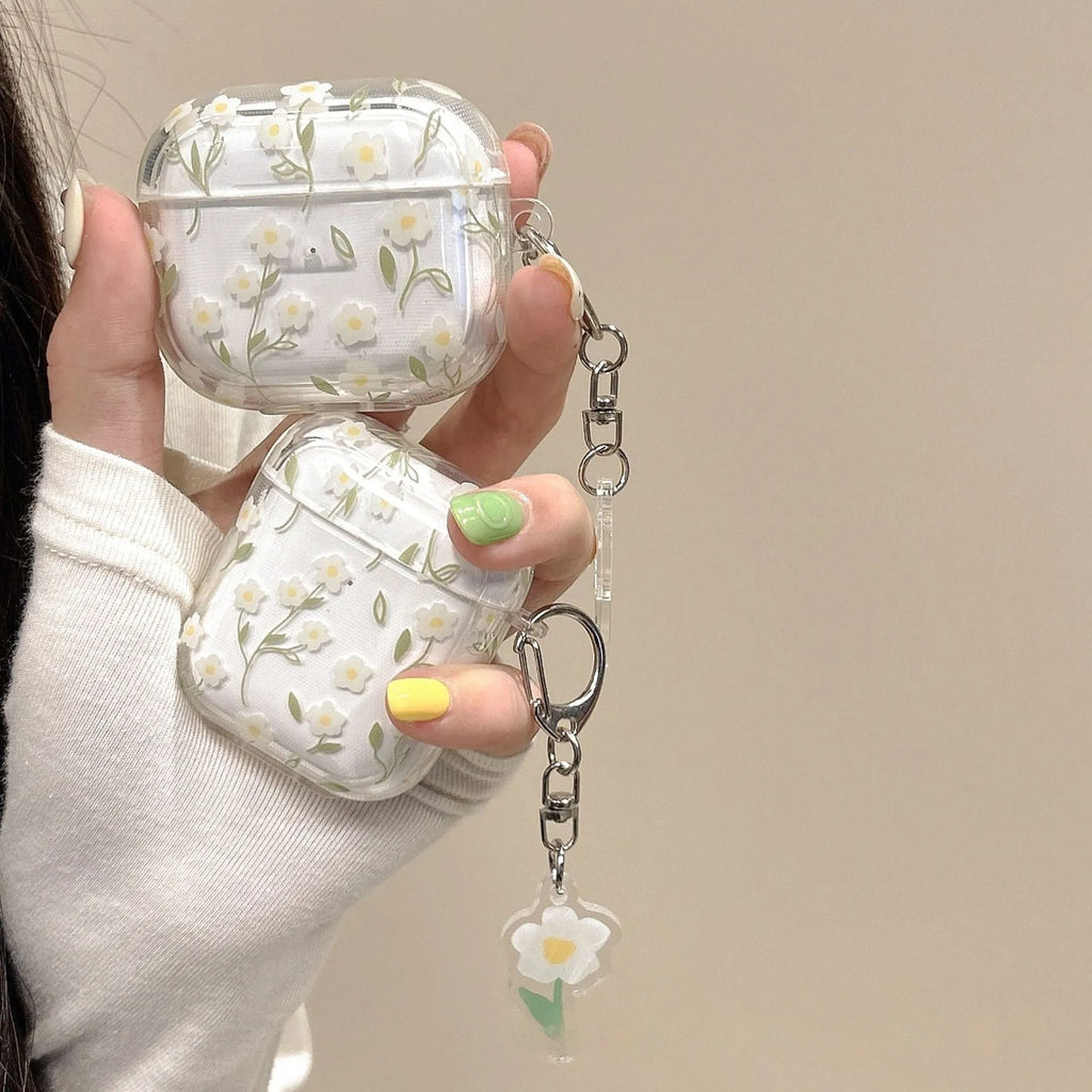 Clear soft TPU protective case for Apple AirPods with white floral oil painting decoration.
