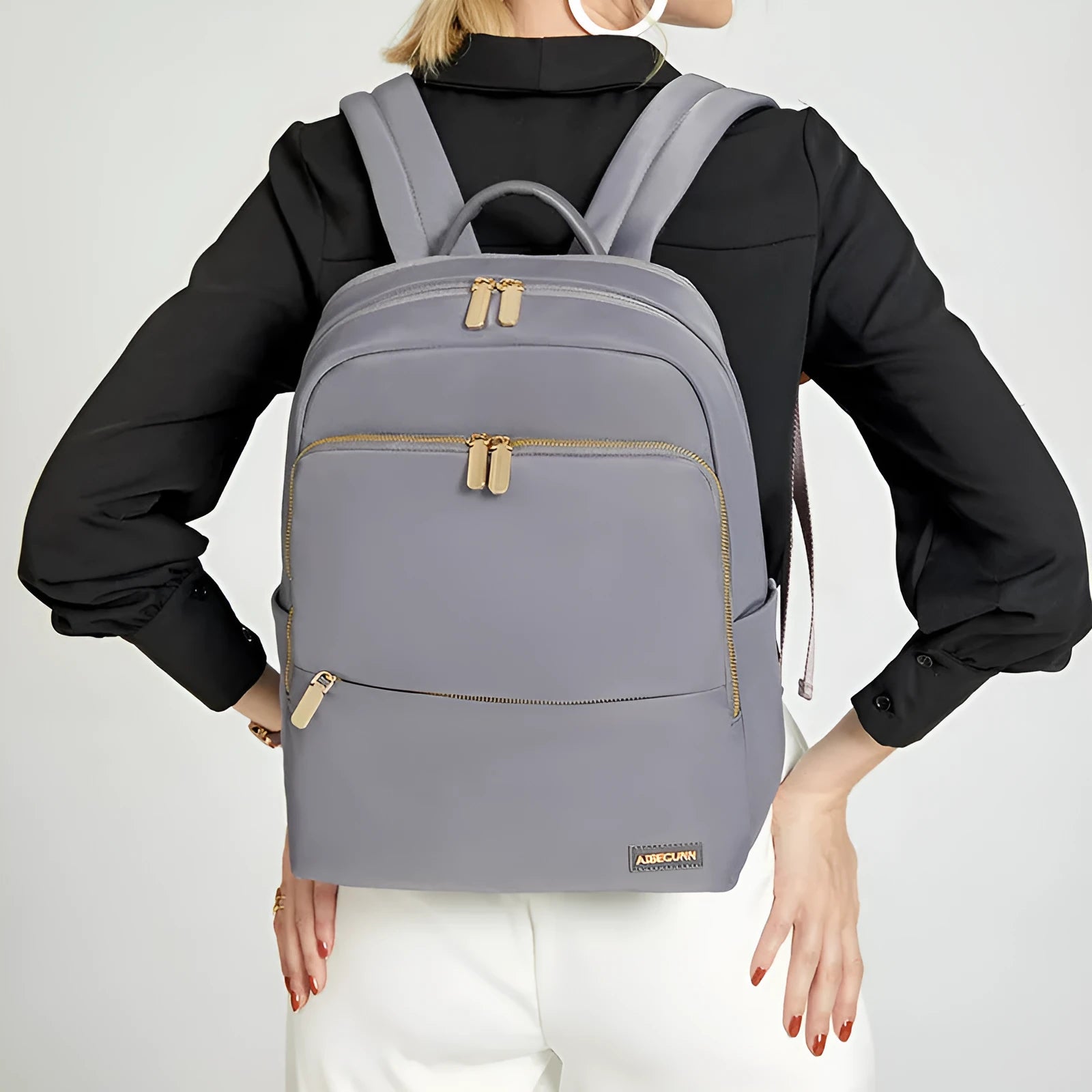 Oxford cloth women's backpack in black or purplish grey with large capacity and waterproof features