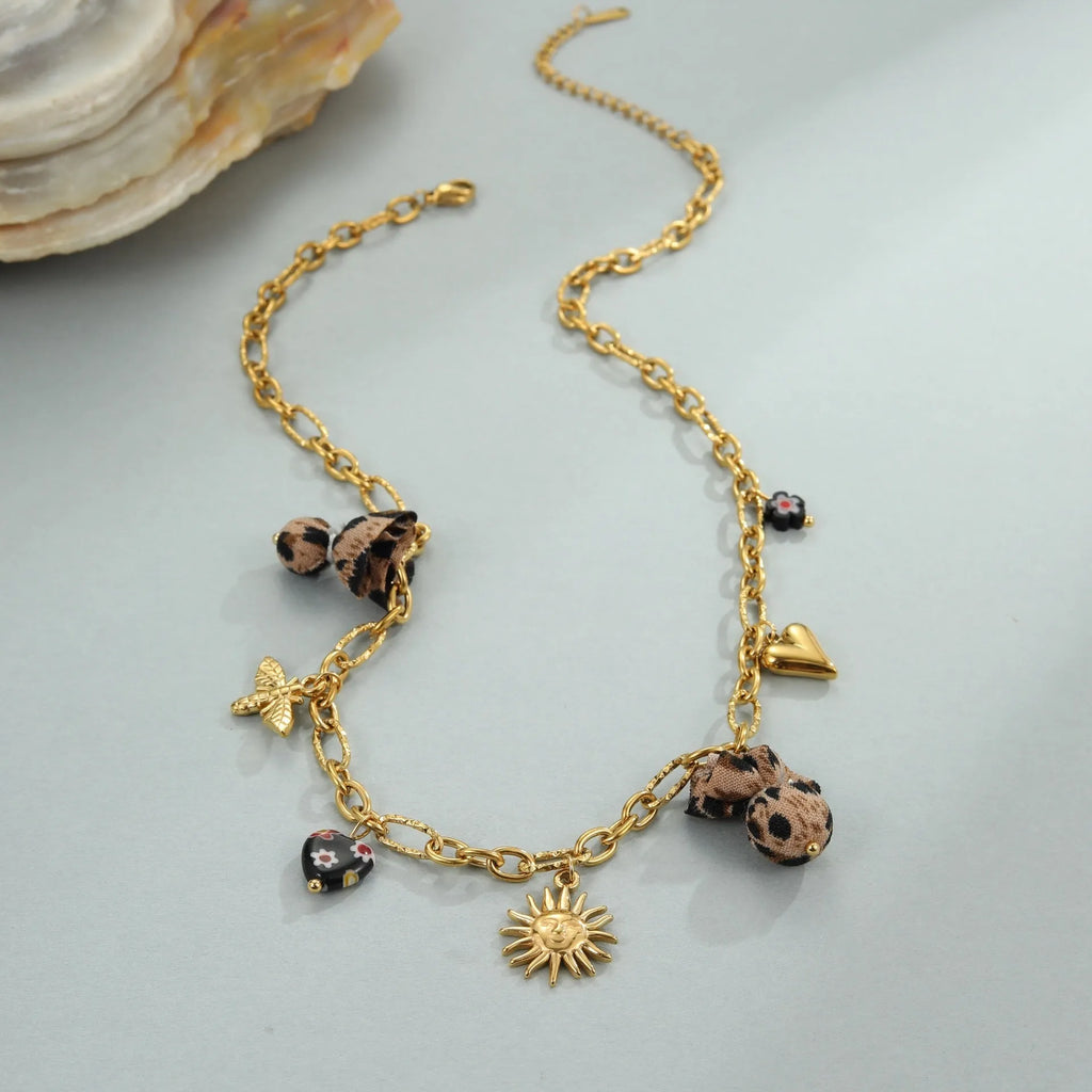 Stainless steel necklace with leopard heart and flower pendant, 18K gold plated, adjustable 41-50cm chain for women.