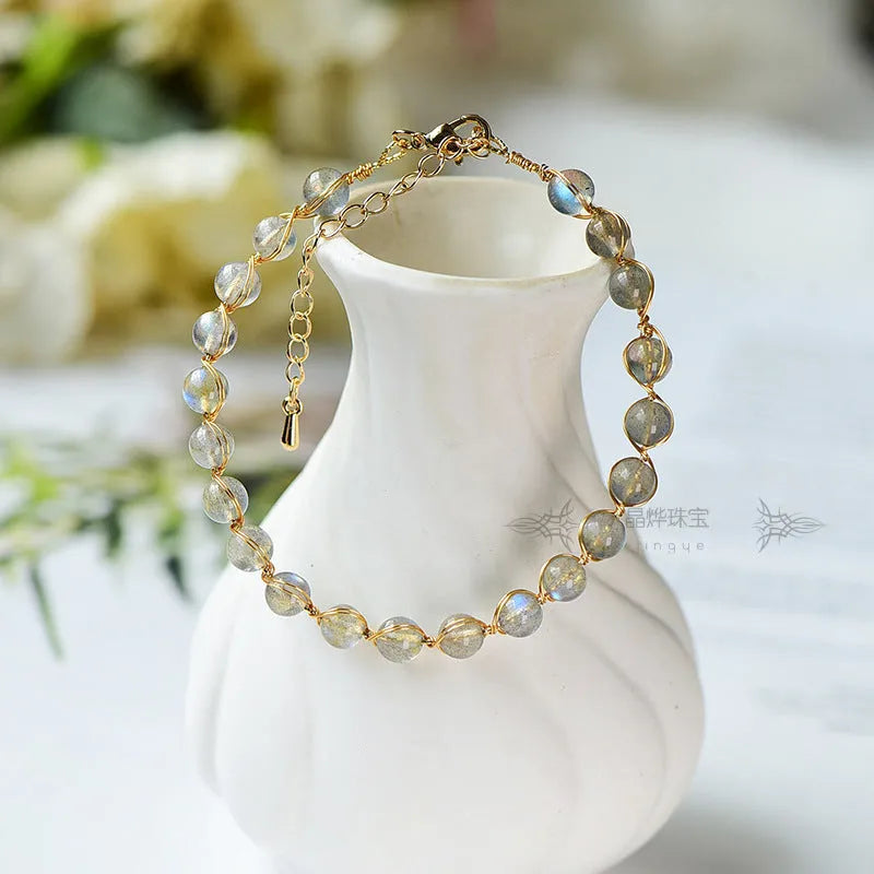 Women's 14K gilded bracelet with natural crystal blue moonstone gemstones in starry sky design